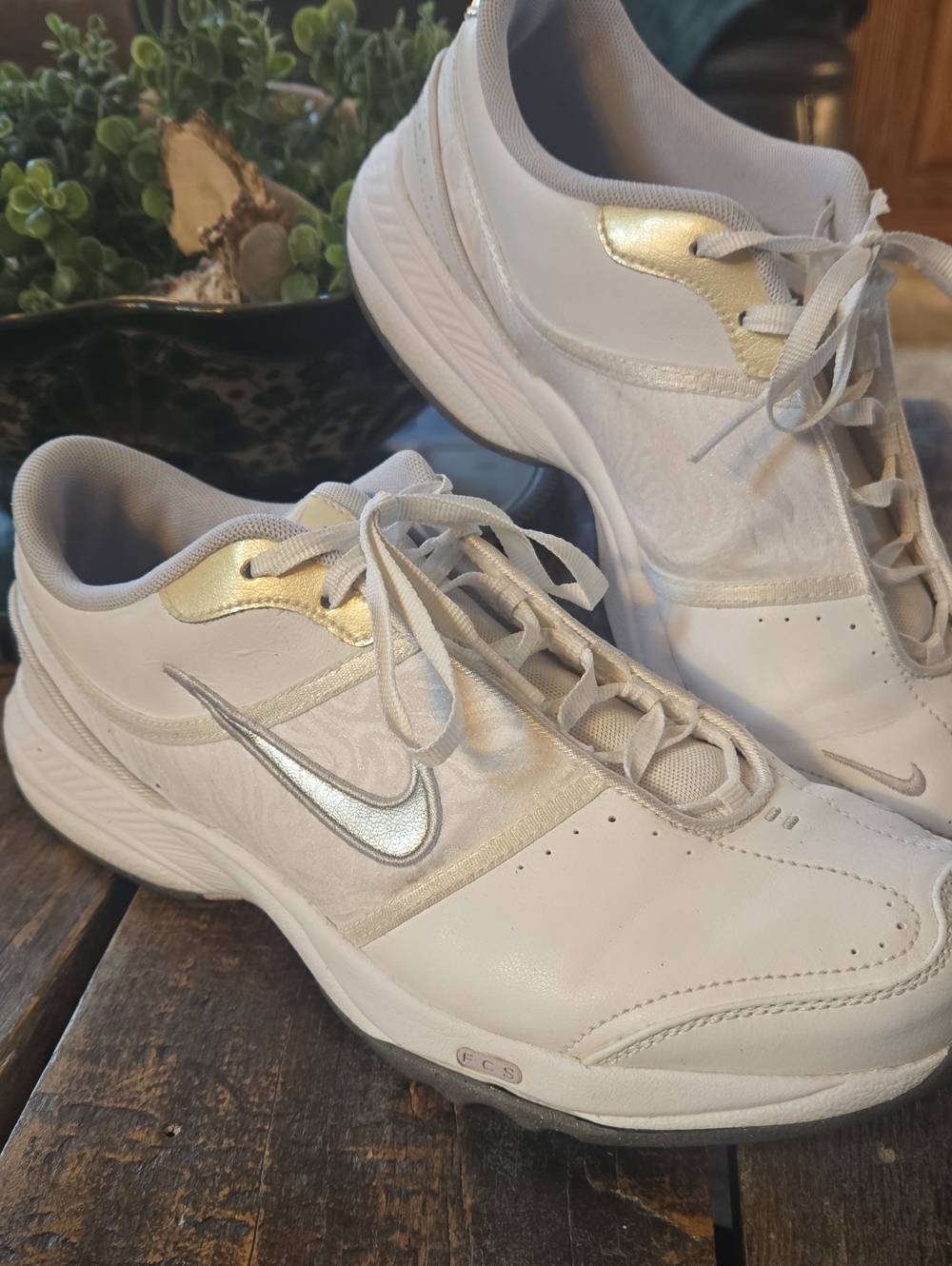 Nike Women's White Sneakers with Gold and Silver Accents